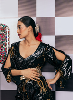 Load image into Gallery viewer, BLACK & GOLD SEQUIN FLARED JUMPSUIT WITH CUT-OUT SLEEVES