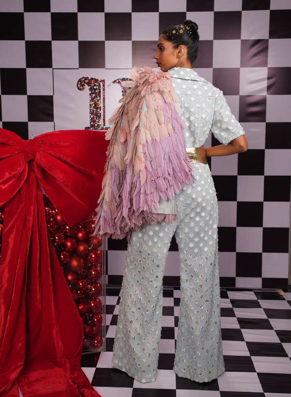 DISTRESSED DENIM JUMPSUIT