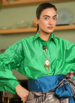 Load image into Gallery viewer, AN EMERALD GREEN TAFETTA SHIRT PAIRED WITH AN ANIMAL PRINT LEATHER OVERLAP SKIRT