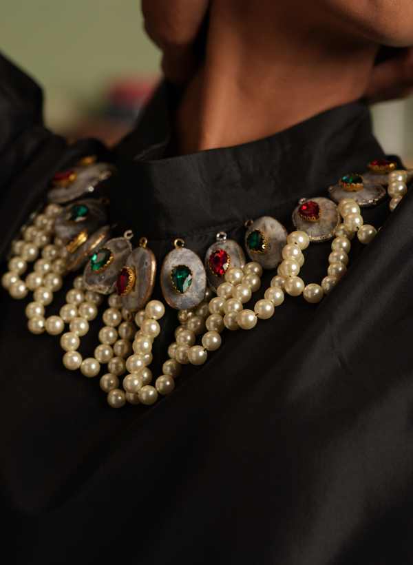 BLACK TAFFETA FLARED DRESS WITH A SWAROVSKI NECKLINE