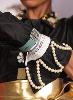 Load image into Gallery viewer, BLACK FLARED DRESS WITH MEASURING TAPE ACCENTS &amp; RHINESTONE BROOCHES