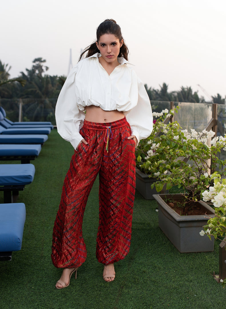 WHITE SHIRT PAIRED WITH RED BANDHANI HAREM PANTS